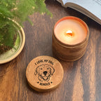 Wooden candle with lid featuring a dog laser engraving and text on a cinnamon candle lid.