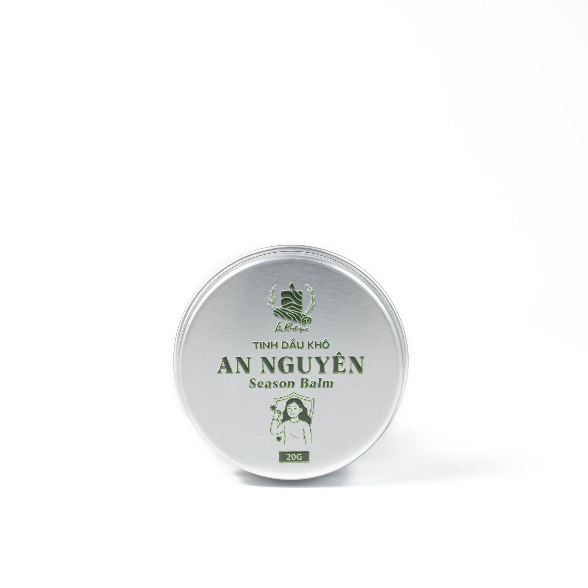 Le Rustique Season Balm in a silver container, enriched with organic essential oil for deep moisture and aromatherapy.