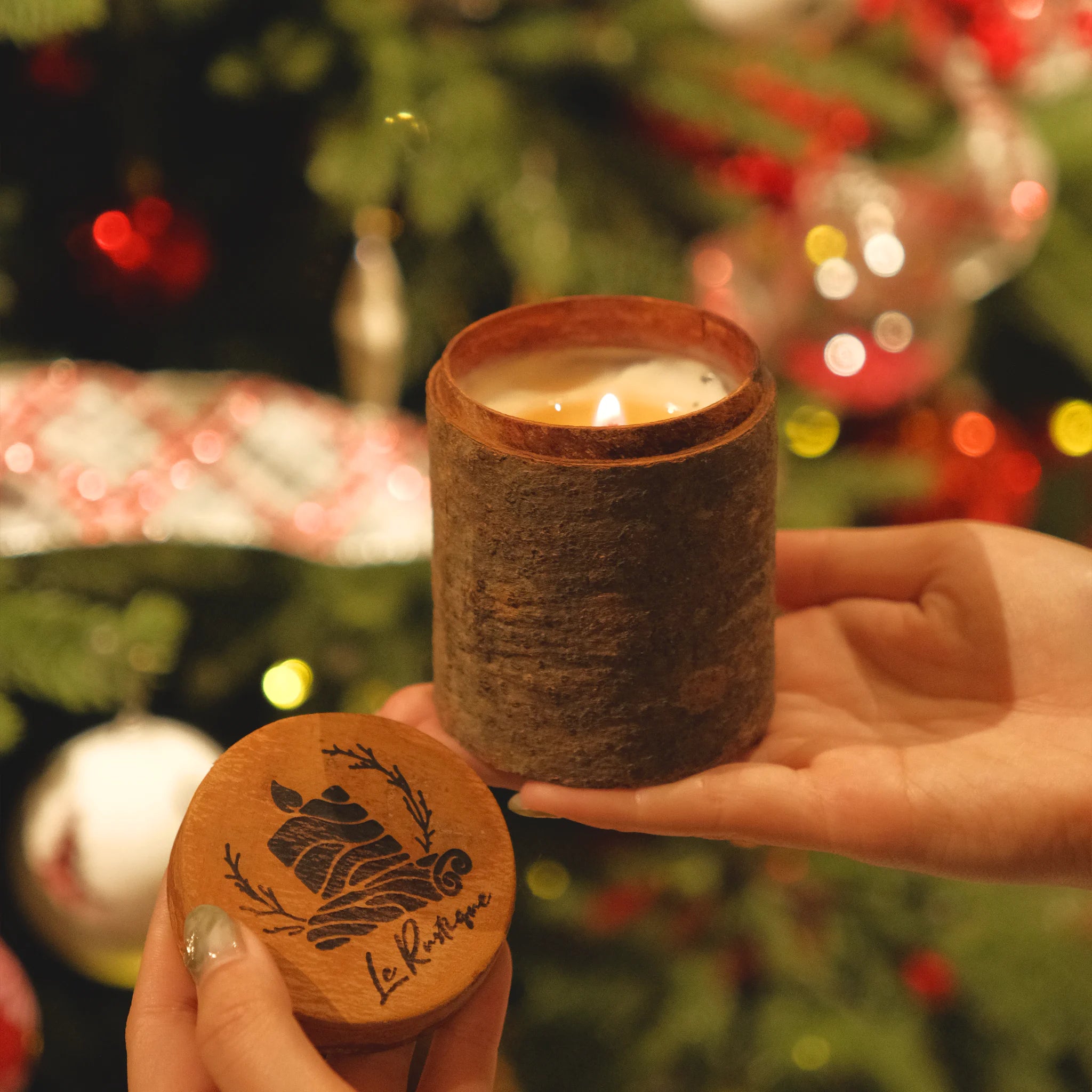 Le Rustique scented candle in christmas background