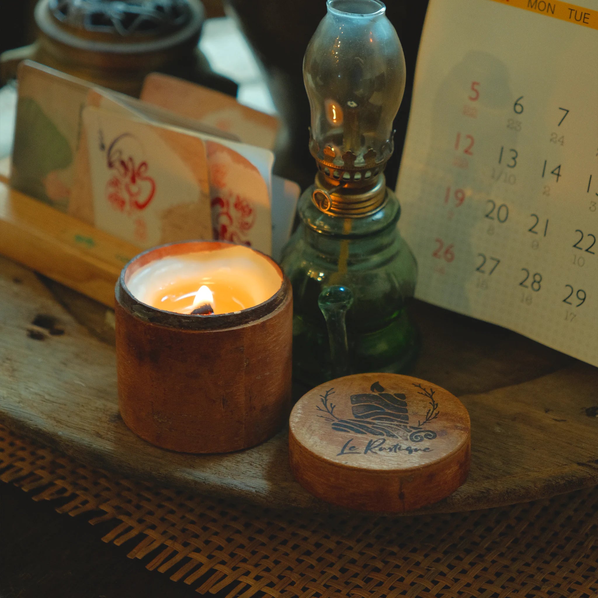 'Youthful Joy' soy wax candle for aromatherapy with vintage decor on table